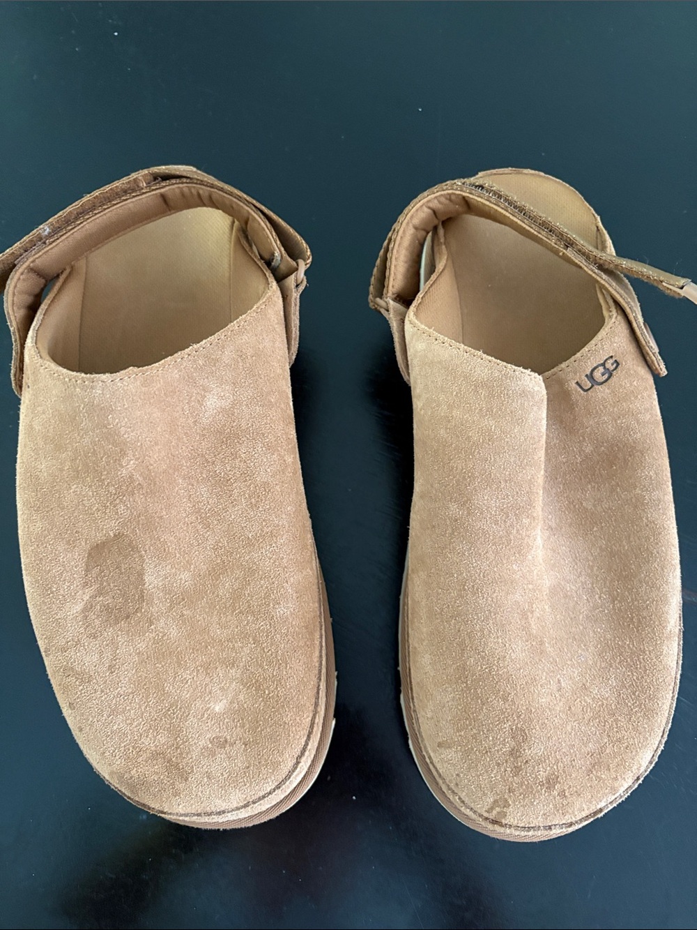 UGG women’s Suede Slip-On Clogs in Chestnut Tan